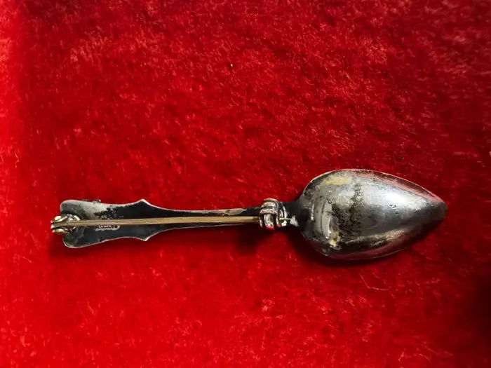 Sterling silver spoon pin close up