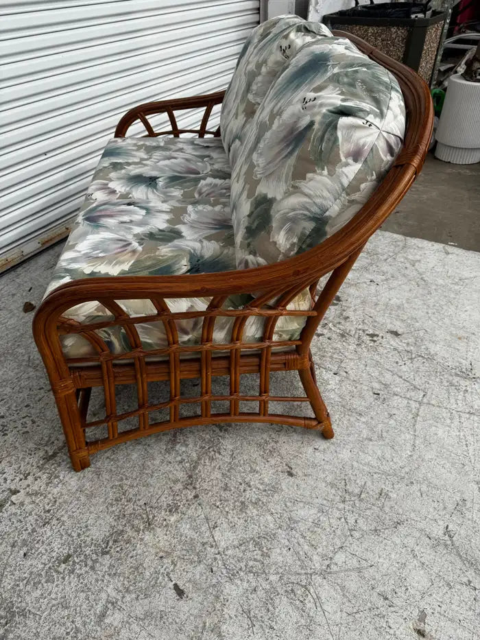 South Sea style rattan loveseat with woven frame