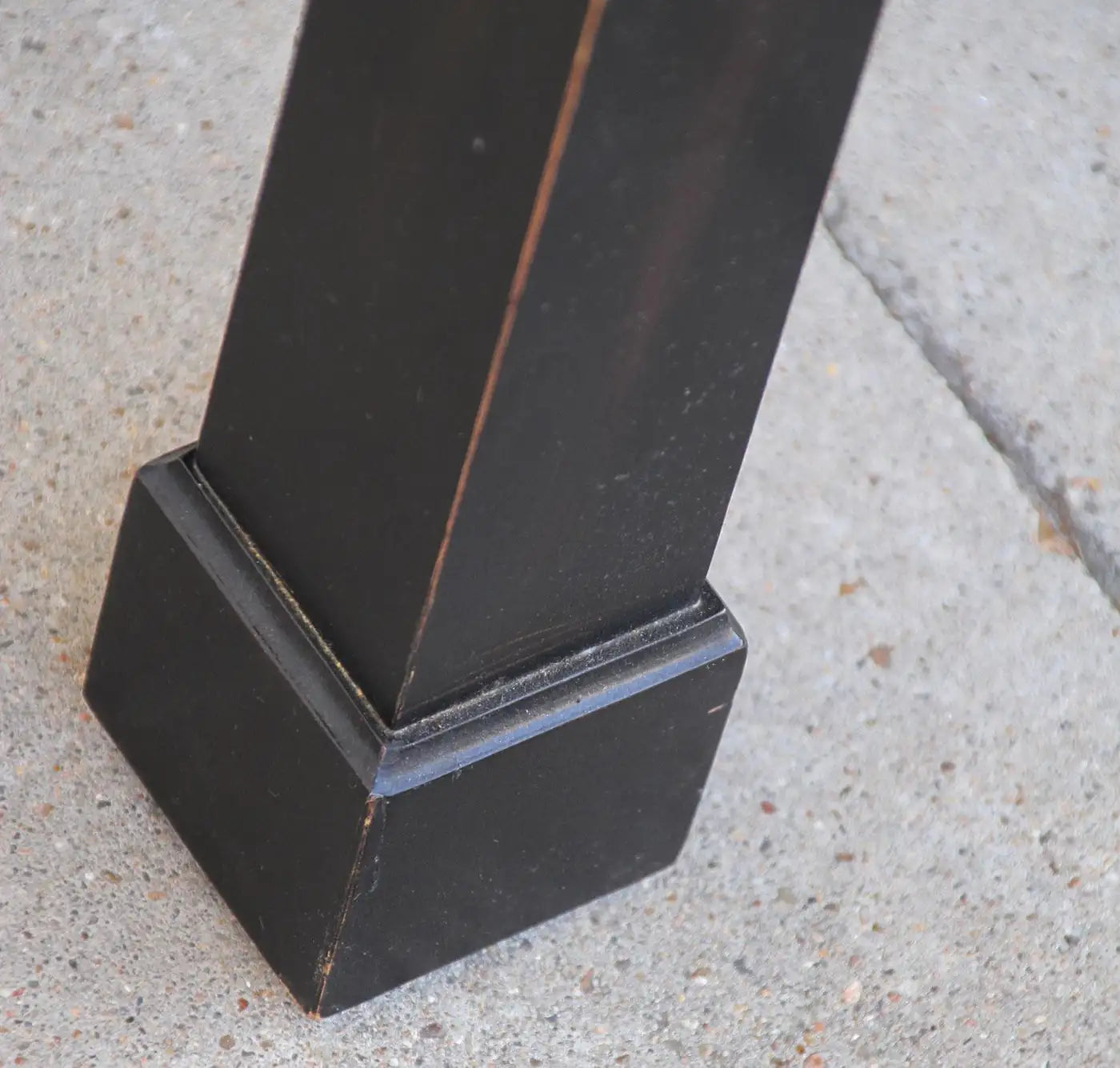 Elegant black console table with Asian hardware