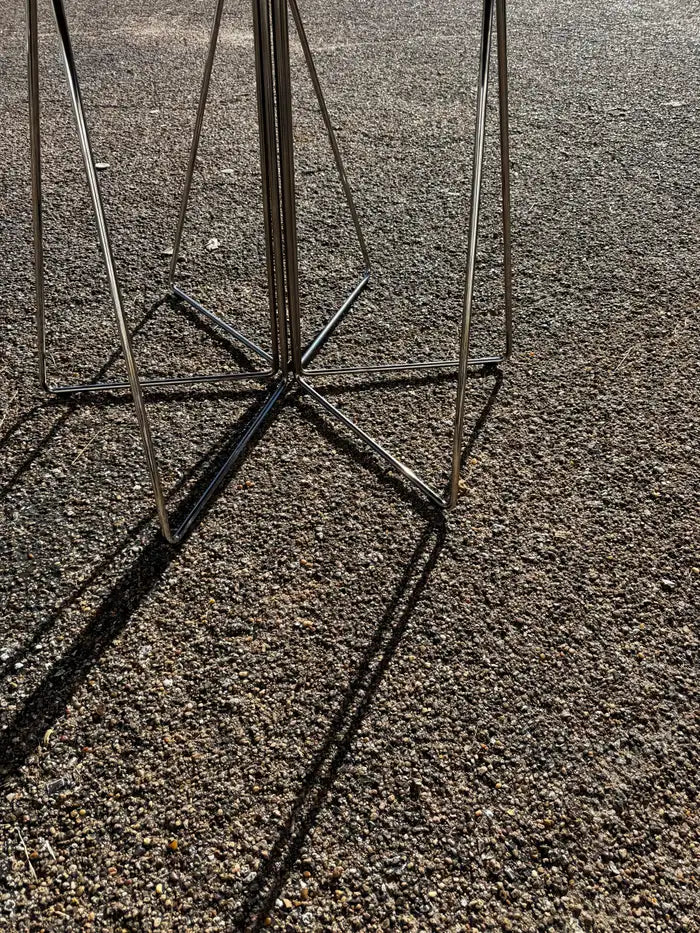 Vintage inspired round table with geometric metal base