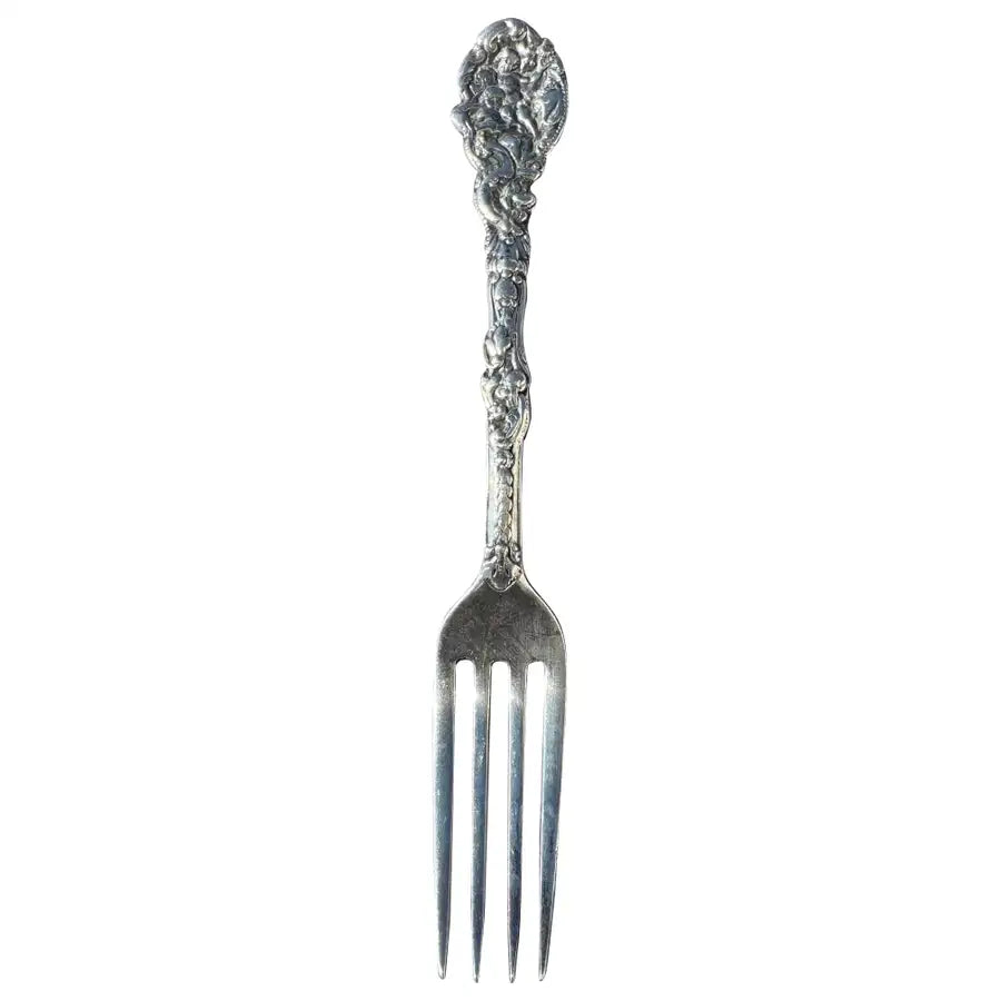 antique sterling silver fork with engraved handle detail