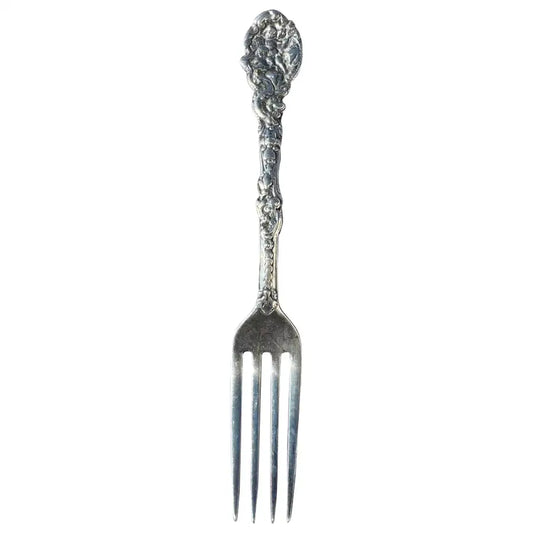 antique sterling silver fork with engraved handle detail