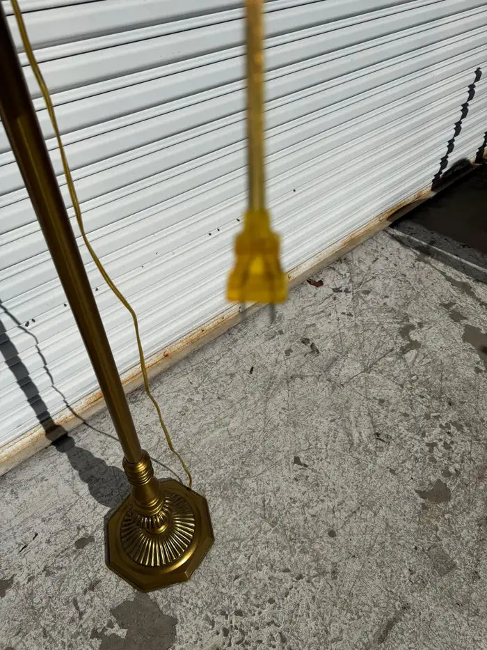 Vintage standing lamp with classic brass details