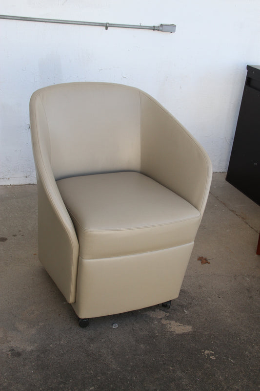 Grey Bernhardt lounge chair with casters