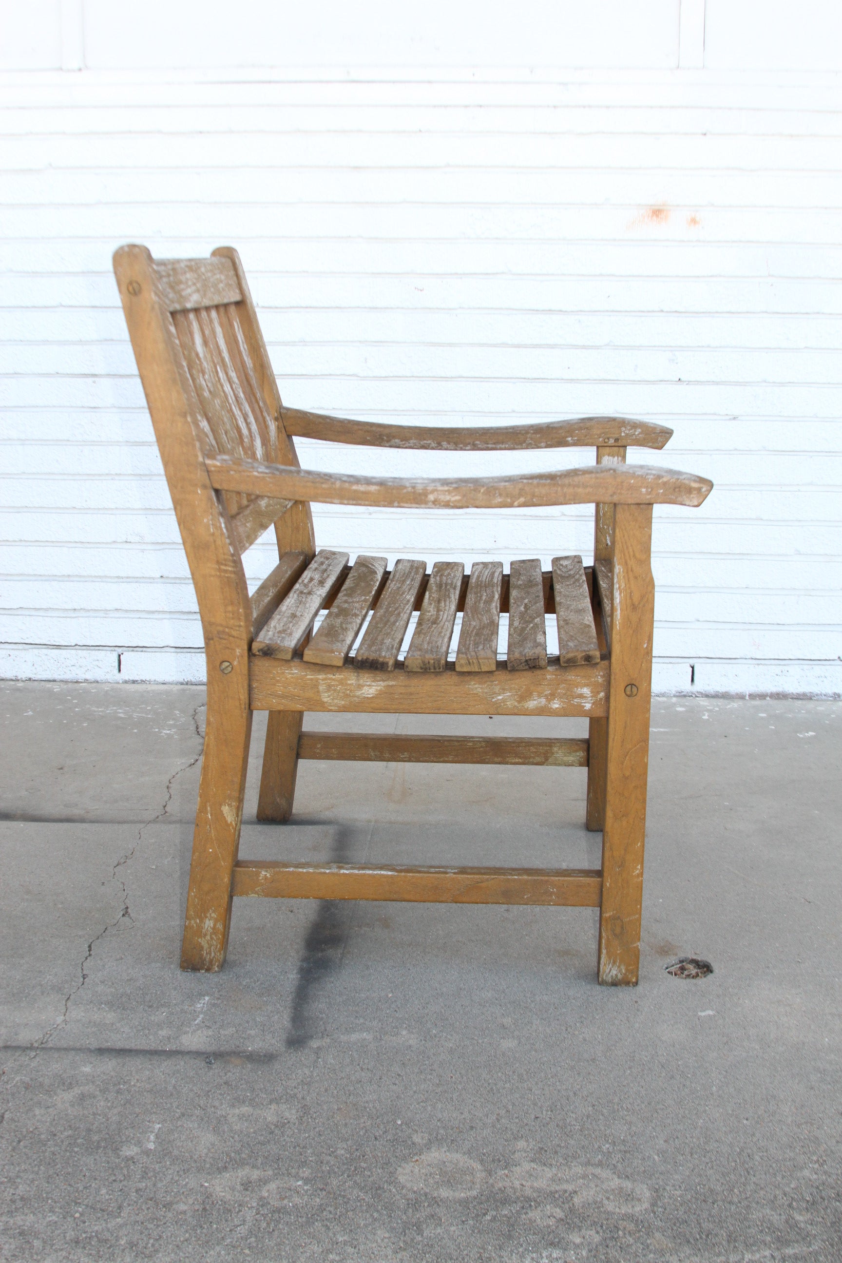 Teak Maritime Heritage Outdoor Bench. Crafted from premium teak, this bench adds a touch of luxury and nautical flair to your patio or garden.