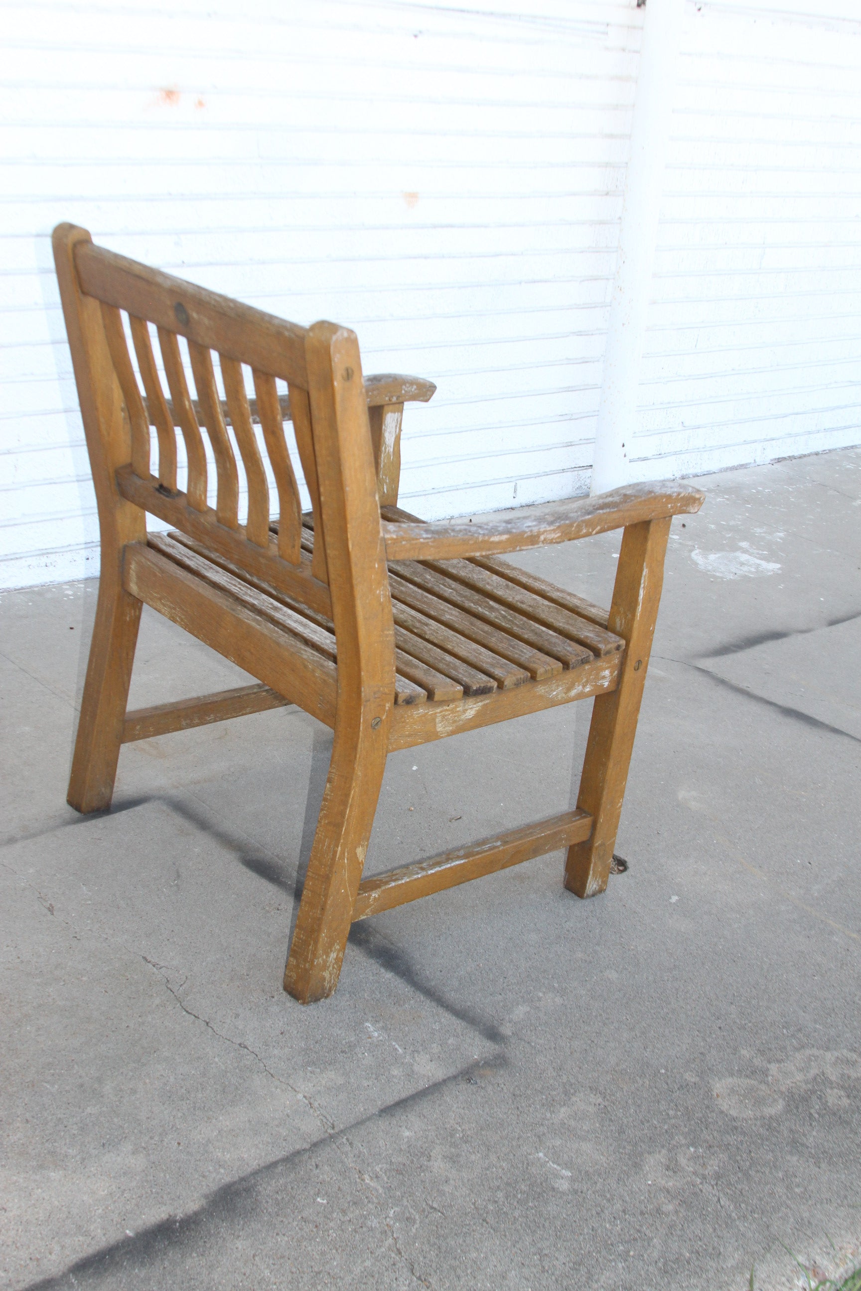 Teak Maritime Heritage Outdoor Bench. Expertly crafted for outdoor living, this bench is a true centerpiece for your outdoor oasis.