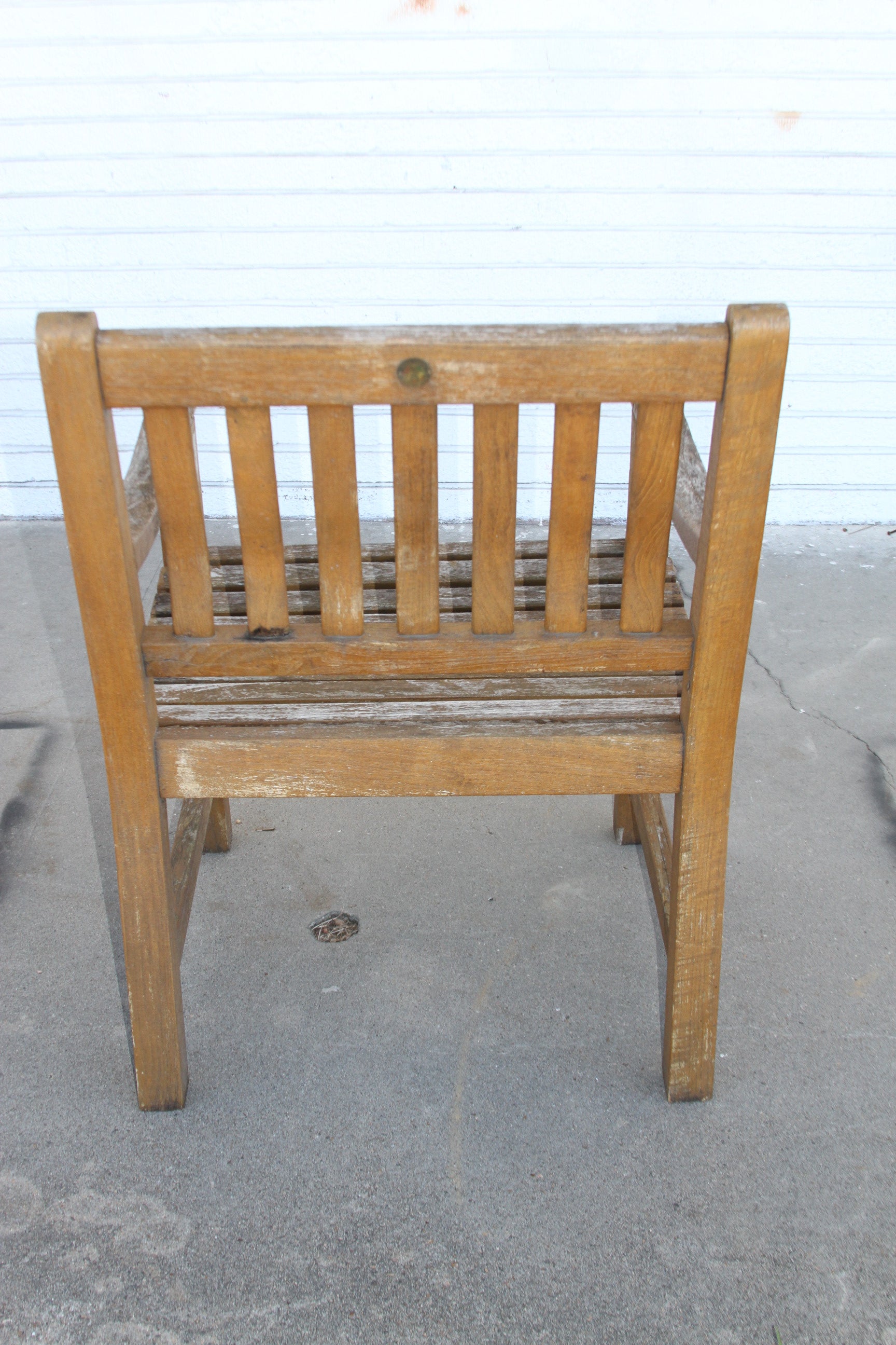 outdoor living space with the timeless charm of the Teak Maritime Heritage Outdoor Bench. Its rich teak and expert craftsmanship make it a focal point for any patio or garden.