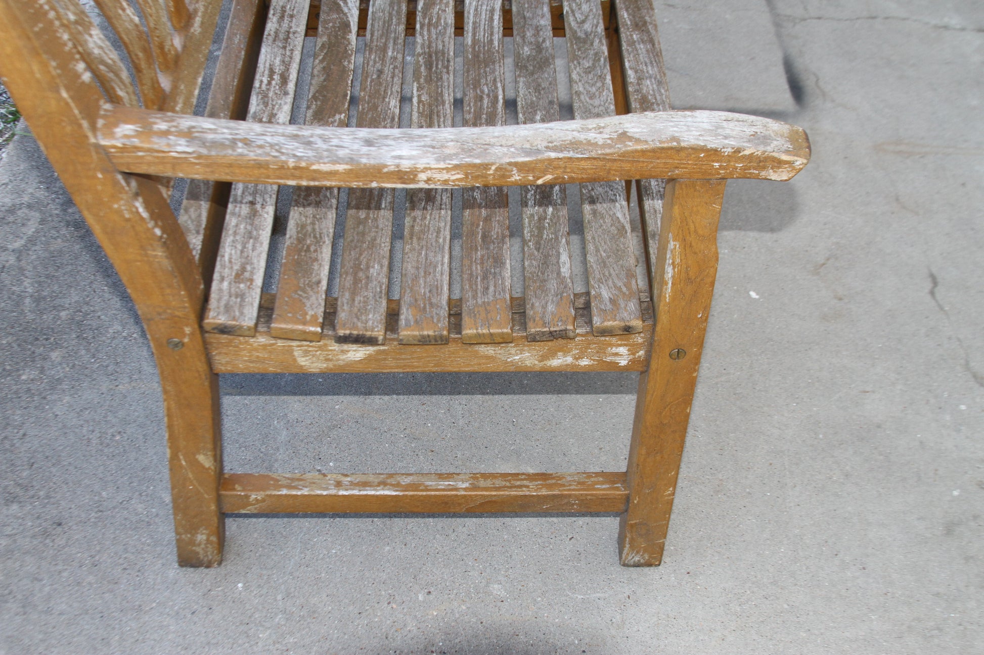 Teak Maritime Heritage Outdoor Bench. Crafted for lasting beauty, this bench is a true investment piece for your outdoor oasis.
