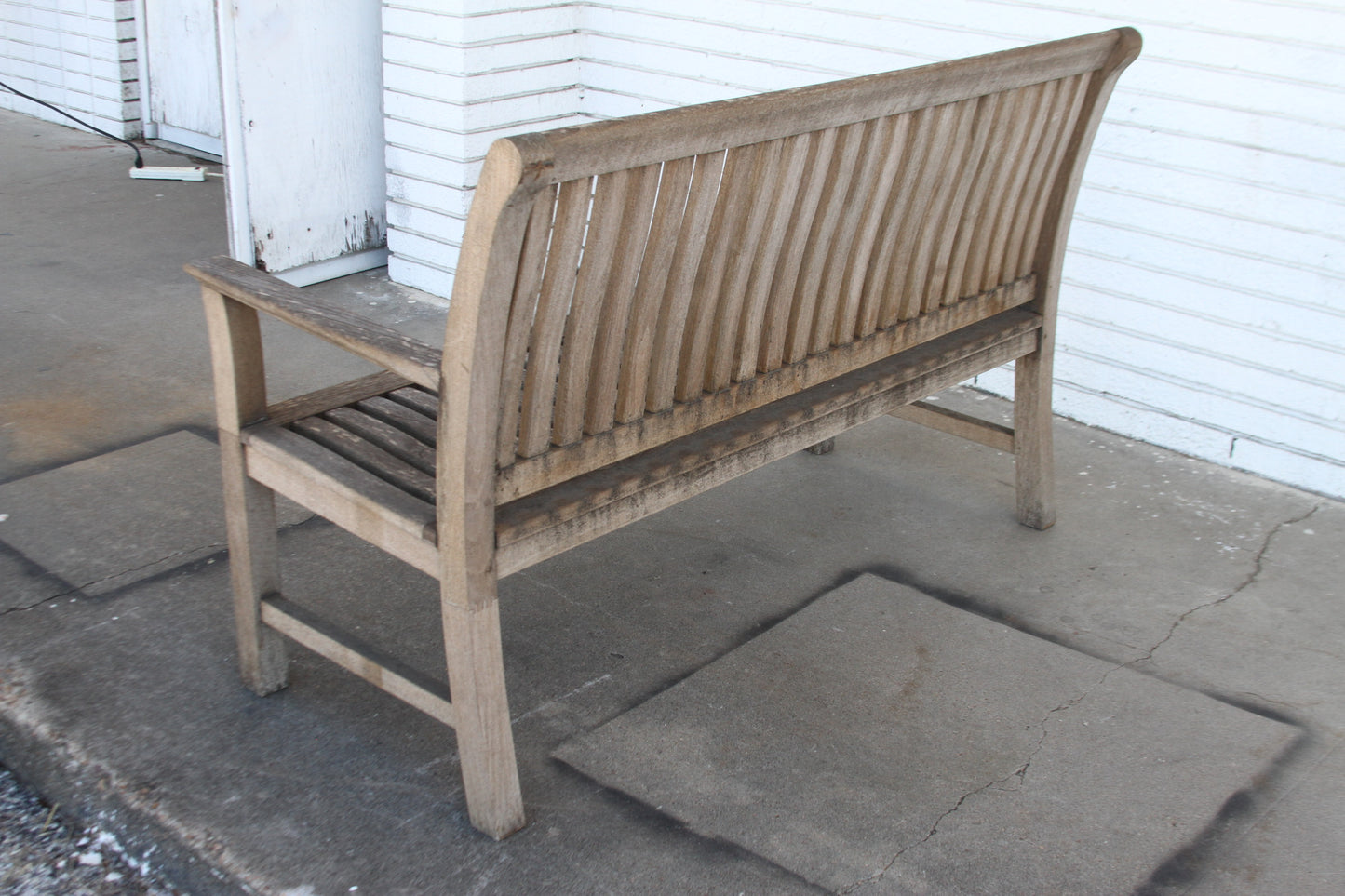 Indulge in the sophistication of the Kingsley Bates Outdoor Bench. Expertly designed with premium materials, this bench is a true statement piece for your alfresco entertaining.