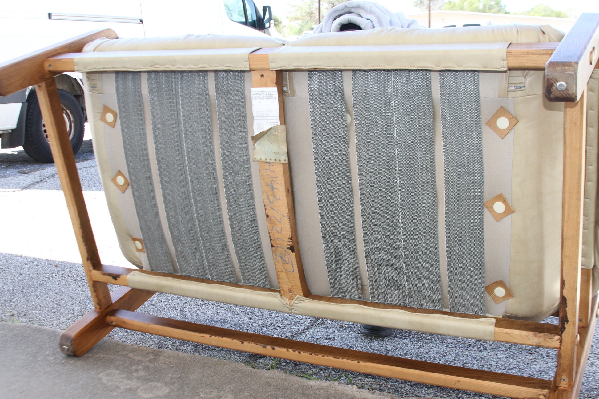 A true investment piece, this loveseat is a rare find among couches for sale.
