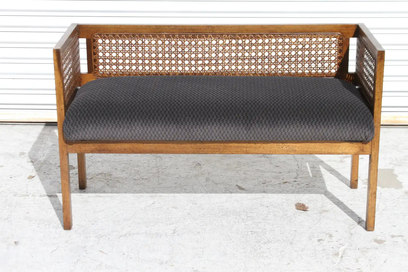 Mid-century walnut settee with fabric seat