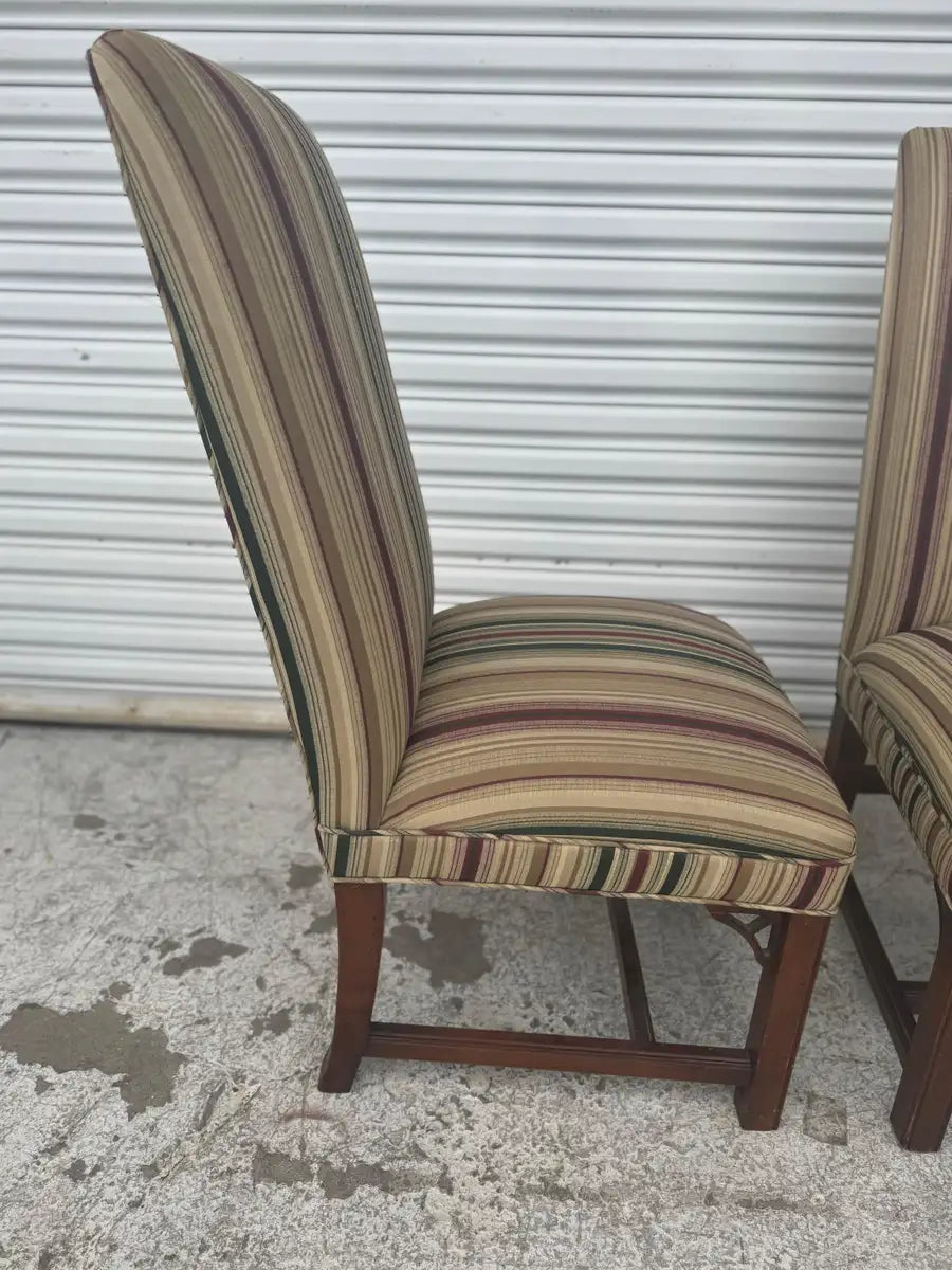 Classic Chippendale chairs with elegant carved patterns