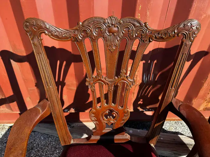 Hand carved mahogany statement armchairs