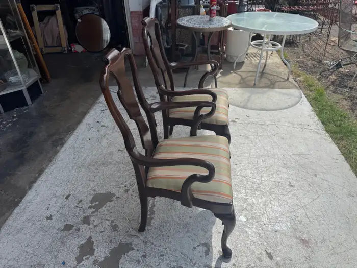 Vintage designer armchairs with upholstered seating