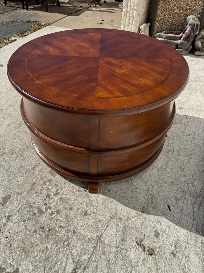 Classic round wood coffee table with rich grain