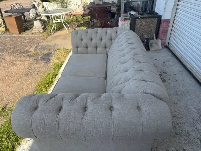 Tufted upholstered loveseat with timeless English-style design
