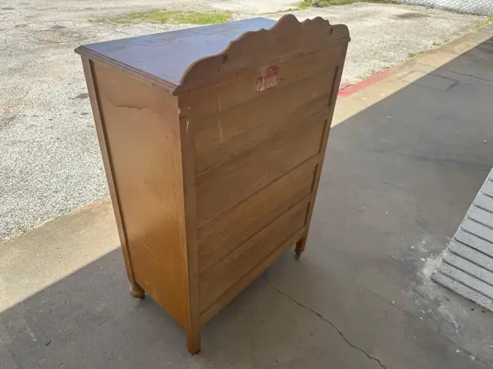 Vintage bedroom dresser with classic wood craftsmanship