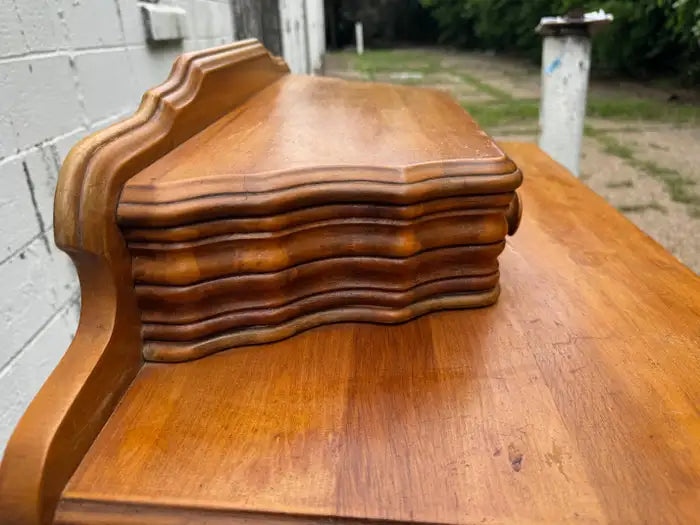 Classic bedroom dresser with carved wood detailing