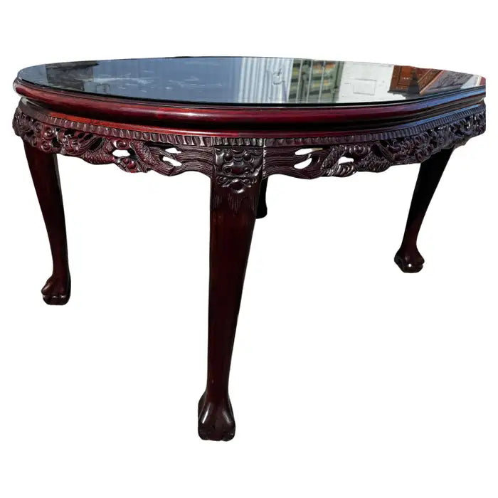 Ornate dining table with mother of pearl accents rosewood surface