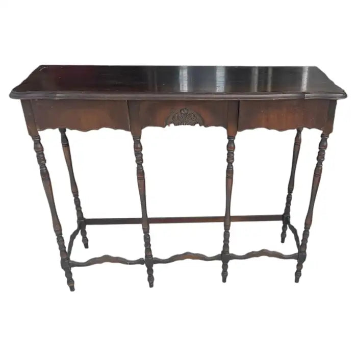 Vintage carved wood entryway console table with ornate detailing