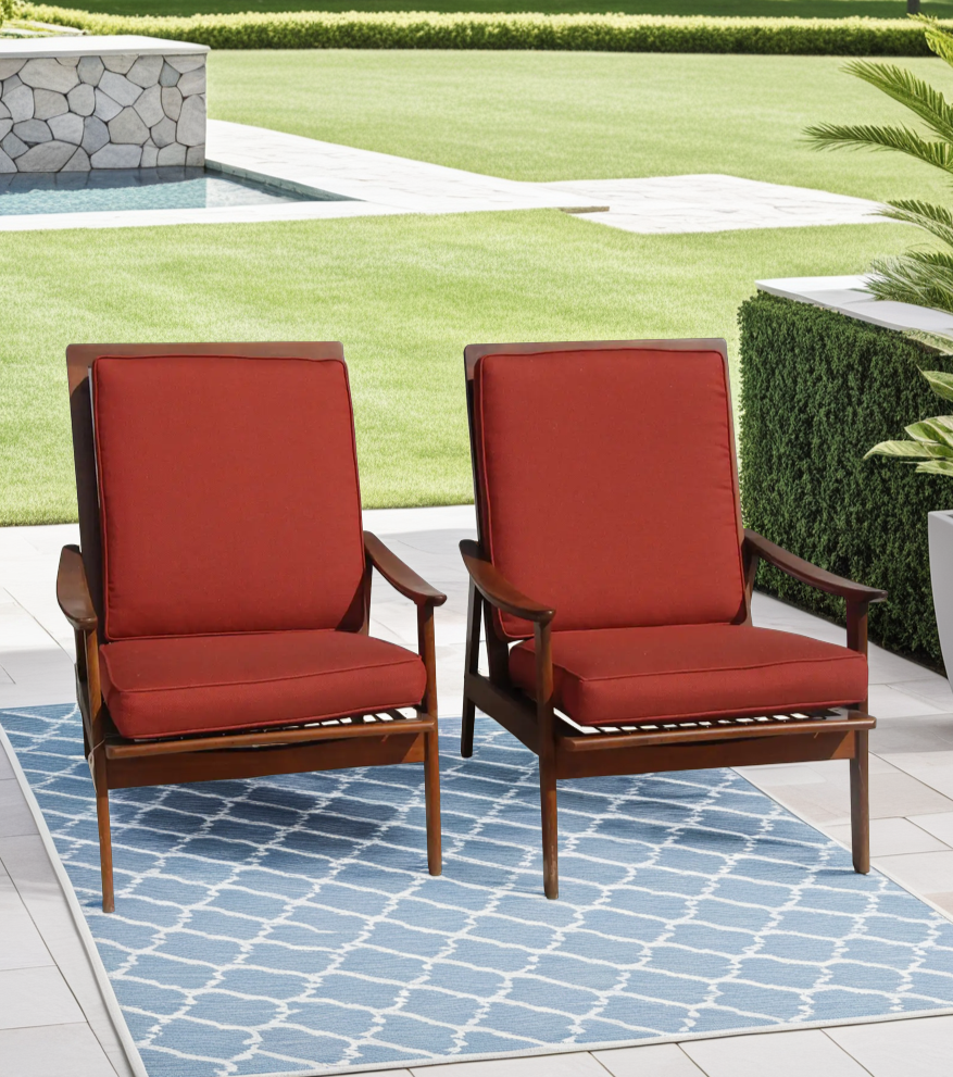 Vintage pair of Danish lounge chairs with red cushions