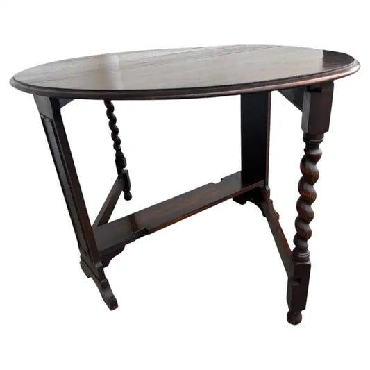 Vintage expandable walnut dining table with drop leaves