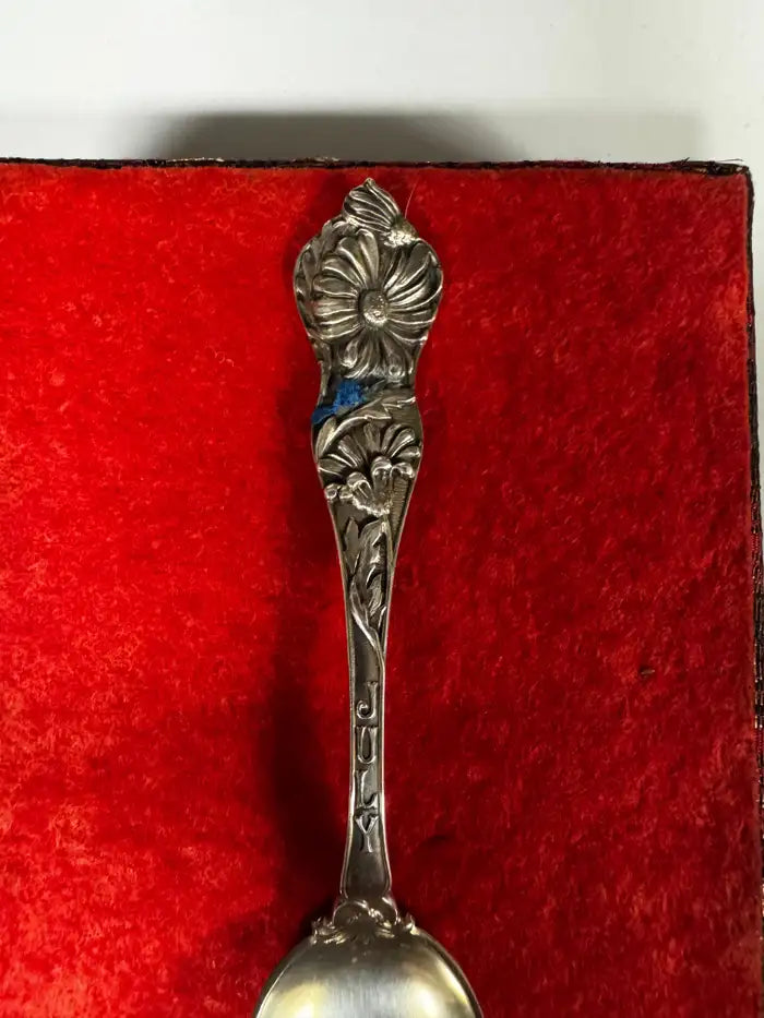 Vintage silver spoon with floral engraving