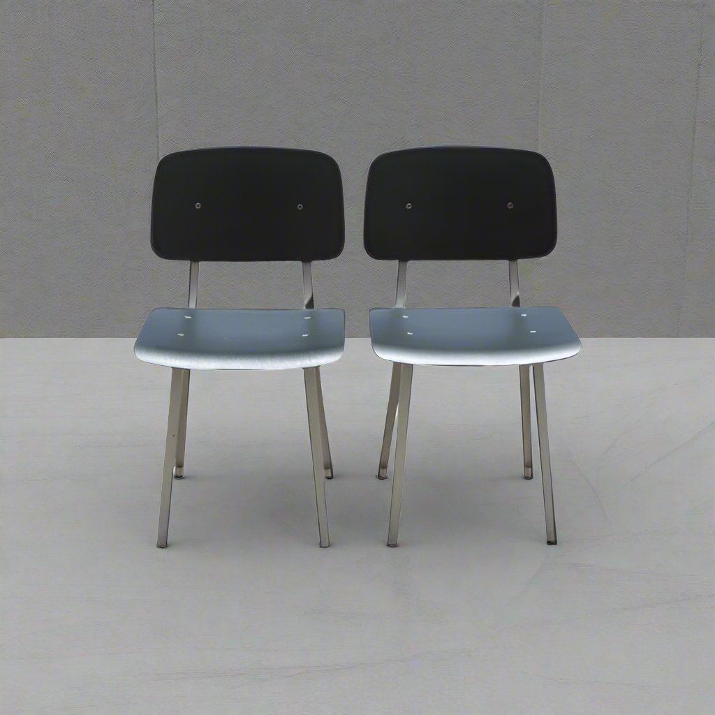 Vintage Jean Prouvé style mid-century side chairs pair.​