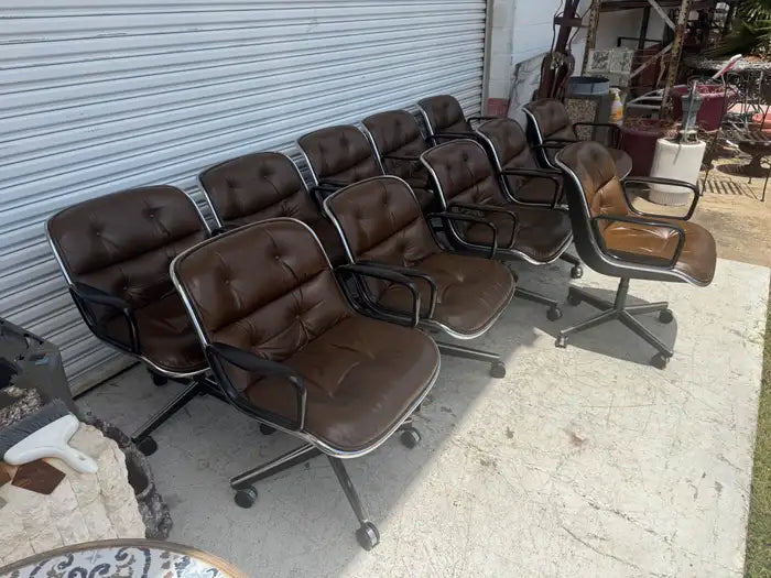 Brown leather executive armchair with classic mid-century design