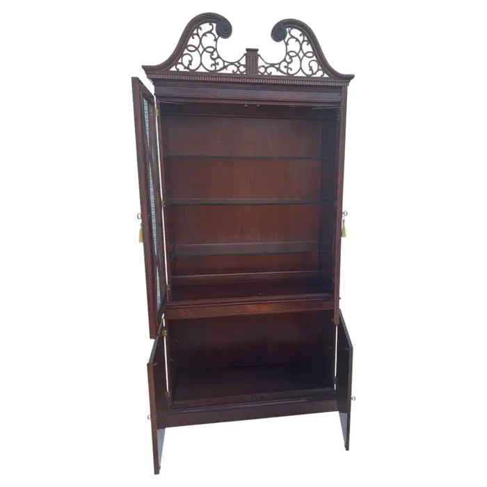 Vintage mahogany breakfront china cabinet with interior lighting