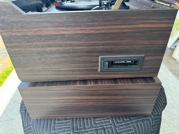 Vintage entertainment center with warm walnut wood finish