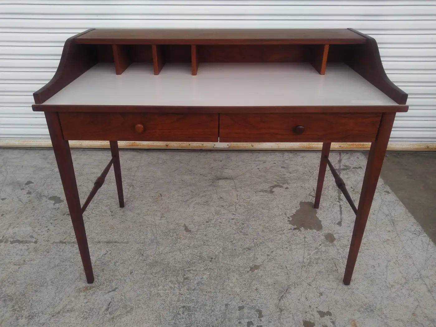 Biscayne desk with white laminate surface built-in cubbies