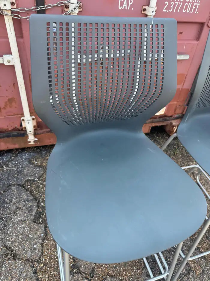 Minimalist chrome counter stool with upholstered seat