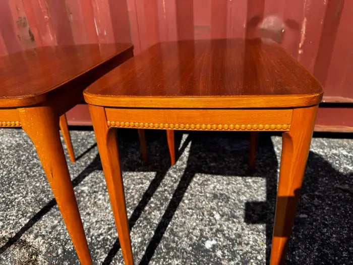 Vintage mahogany accent tables with rich wood grain