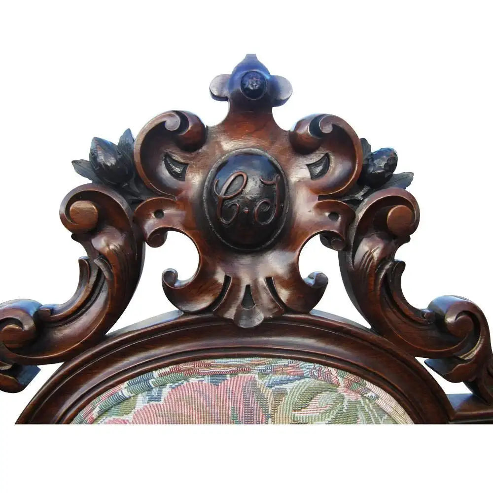 Decorative vintage armchair with carved wood posts