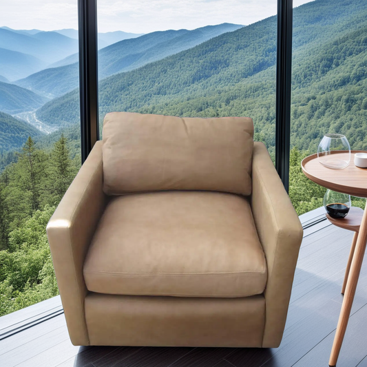 Vintage pair of Pfister lounge chairs in tan leather