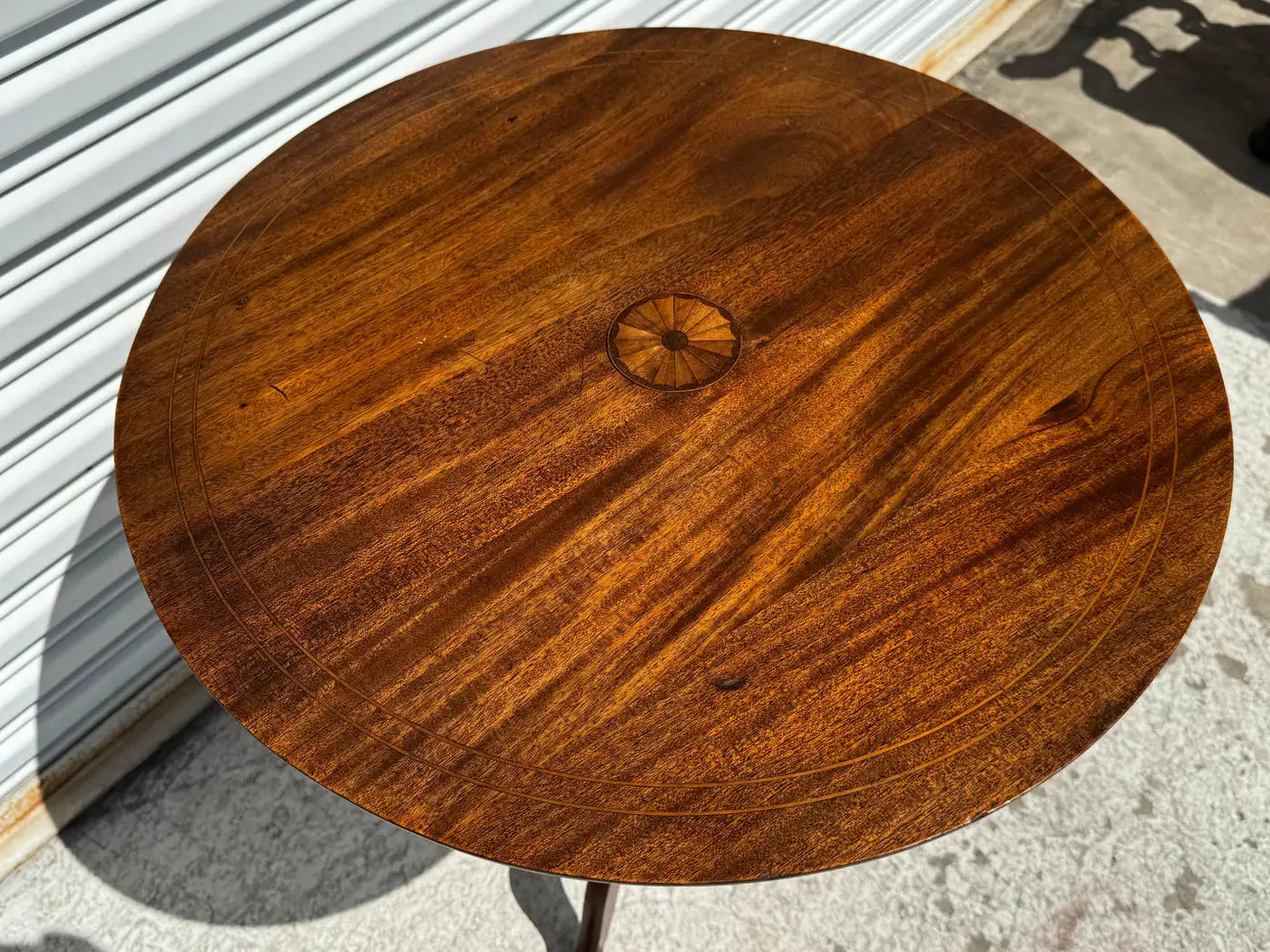 Vintage Mahogany Round Table with Carved Detailing