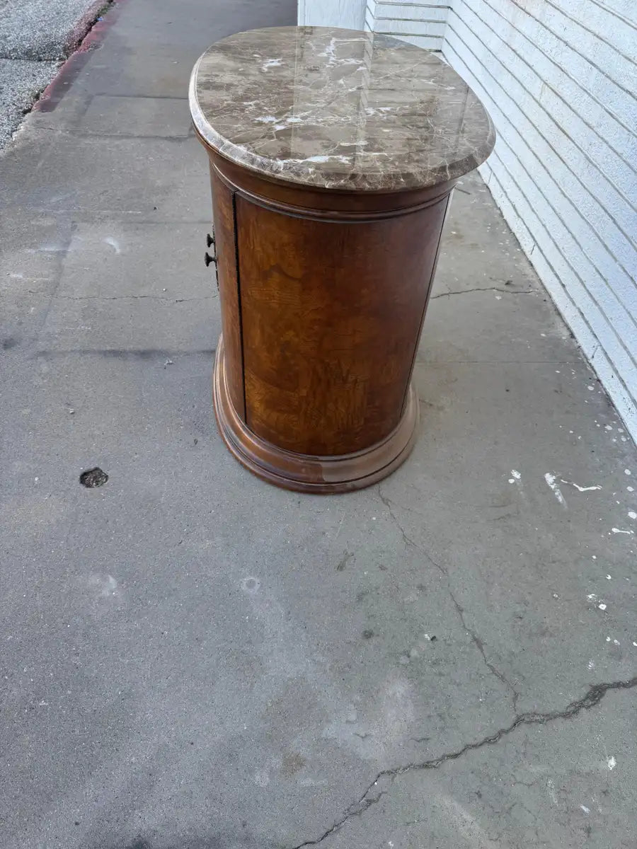 wooden cabinet with marble top and refined craftsmanship