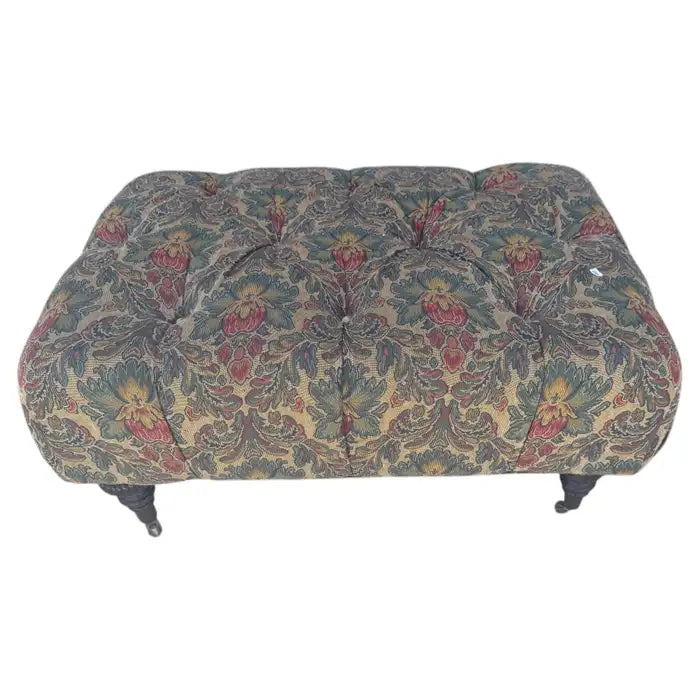 Vintage tufted upholstered ottoman with elegant decorative details