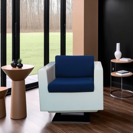 Vintage white fiberglass lounge arm chair with blue cushions