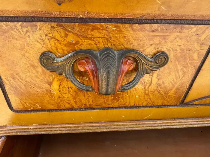 Antique-style four-drawer chest with refined wood detailing