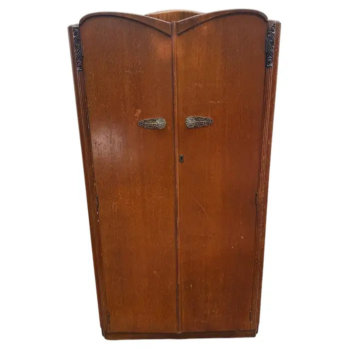Vintage gentlemen wardrobe armoire with classic wood craftsmanship