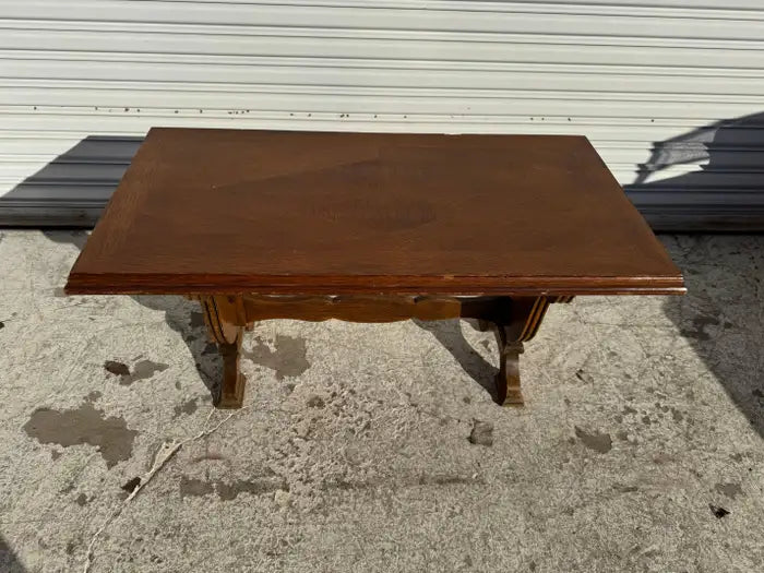 Walnut coffee table with architectural base