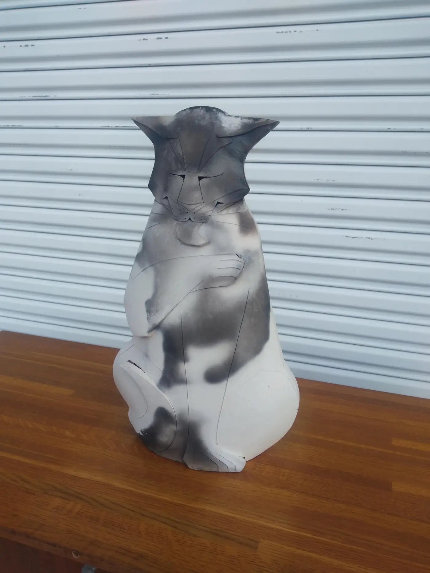 Unique handmade pottery cat figurine in grey and white