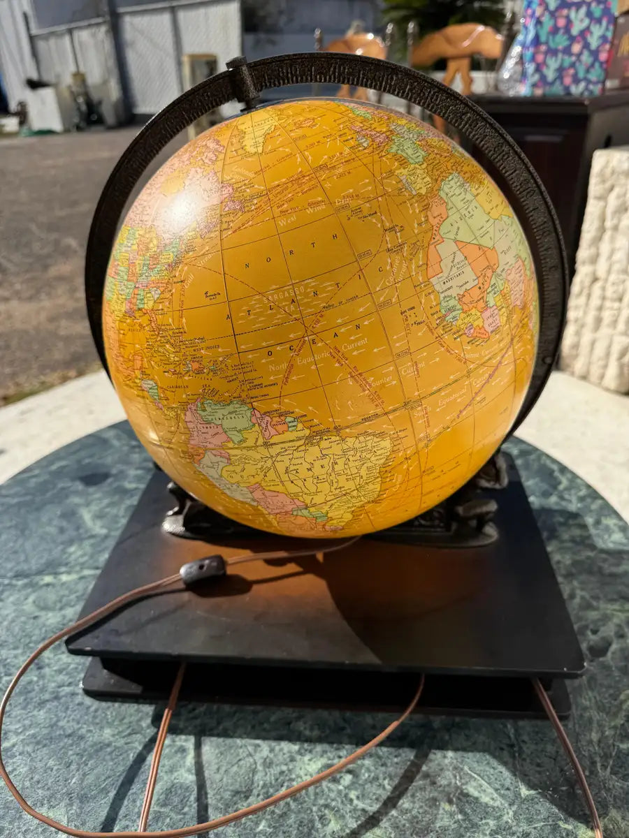 classic world globe with light and wood base