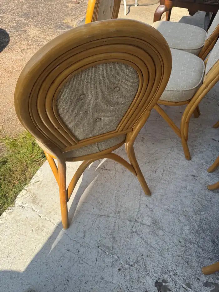 Vintage rattan dining room chairs with handcrafted texture