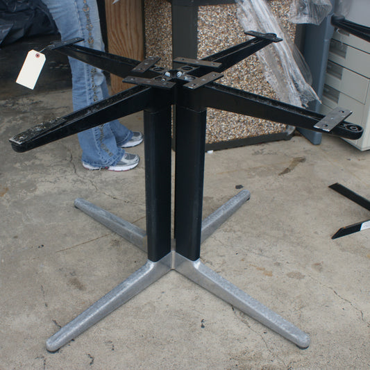 Vintage aluminum dining table base with mid century modern design and retro style.