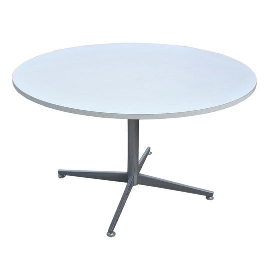 4 ft Round Herman Miller Eames White Laminate Table. Explore classic mid-century style crafted with precision for both dining and conference use.