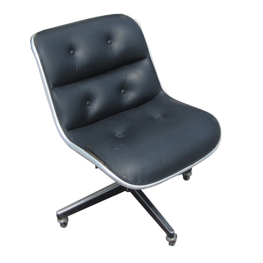 Black Leather Knoll Pollock Side Chair.  Tufted black leather with polyurethane and polyester padding over molded shell with a chrome trim waterfall front frame.