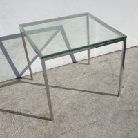Knoll style Glass Table - Experience the perfect blend of form and function with this Glass and Chrome Side Table, crafted to reflect the timeless sophistication of Knoll design.